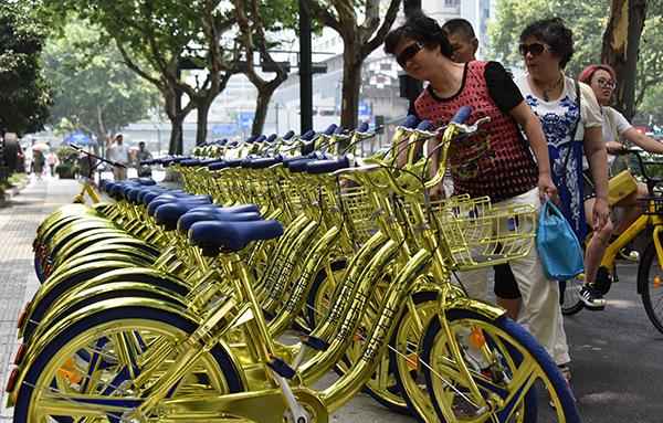 停放(fàng)在杭州街頭的酷騎單車。 東方IC 資料圖